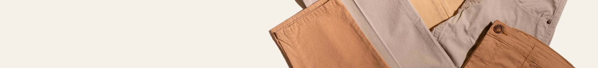 Close-up of beige pants with a blurred background