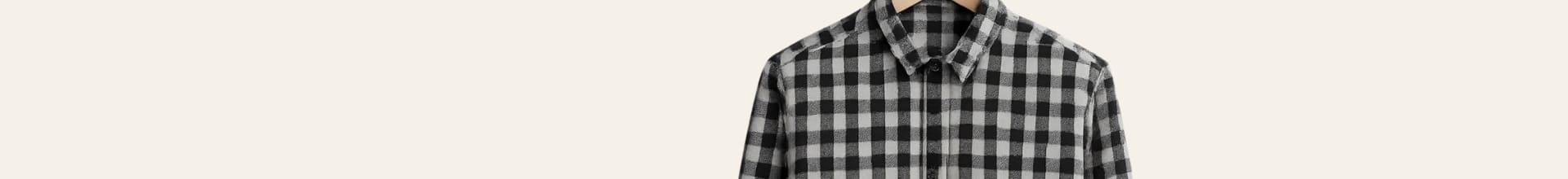 Black and white checkered shirt on a light gray background