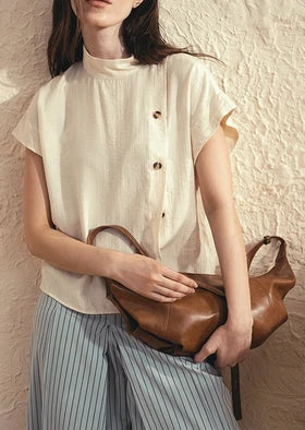 a girl having a bag in his hand