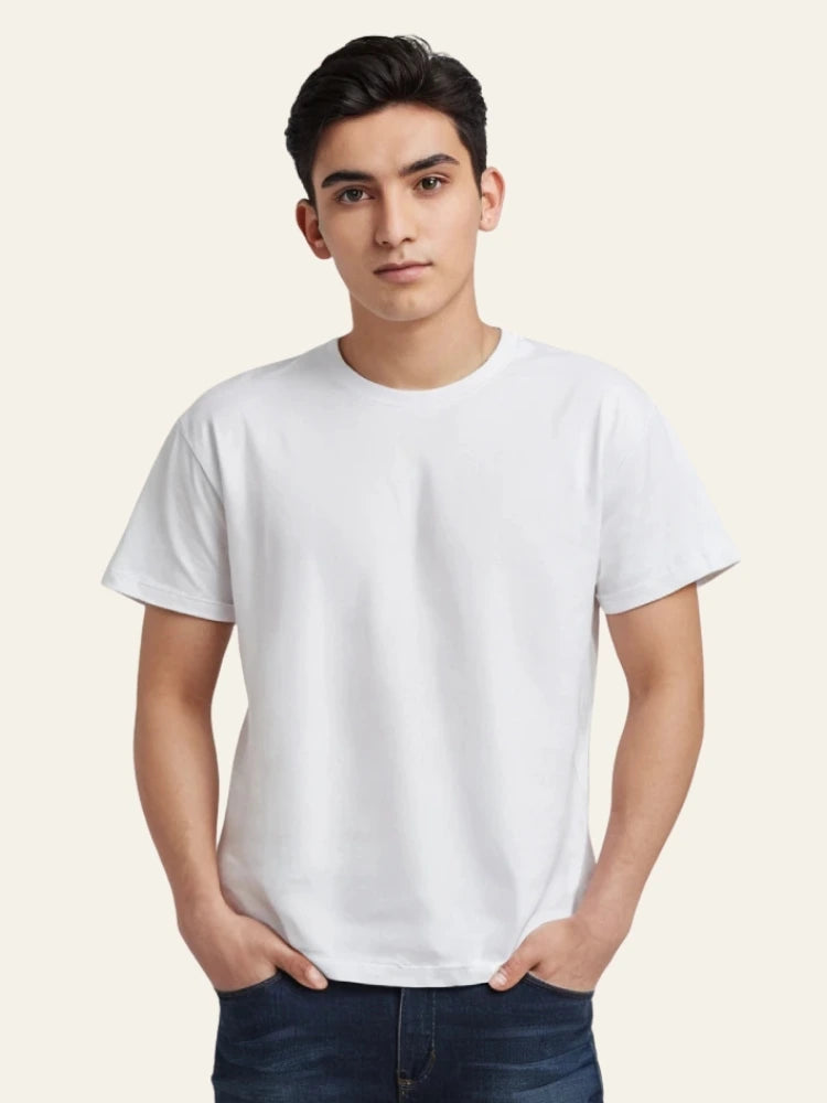 Person wearing a plain white t-shirt against a light background Plain Colourful T-Shirt Royal Outfits Plain T-Shirts