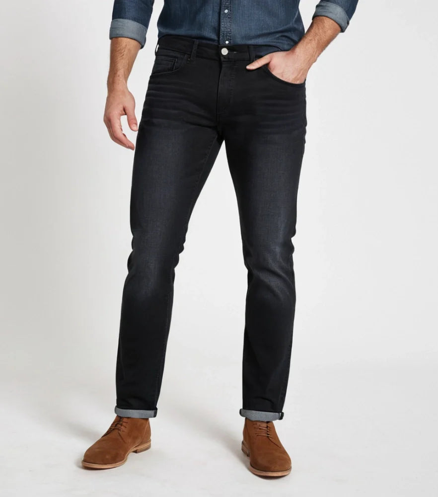 Model wearing slim straight-fit jeans made with stretchable cotton lycra fabric, light blue wash - Royal Outfits Straight Jeans with Cotton Lycra Royal Outfits Jeans