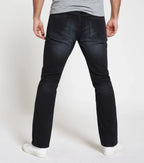 Model wearing slim straight-fit jeans made with stretchable cotton lycra fabric, light blue wash - Royal Outfits Straight Jeans with Cotton Lycra Royal Outfits Jeans