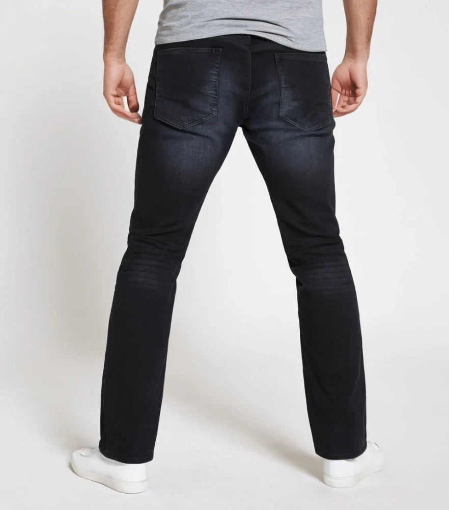 Model wearing slim straight-fit jeans made with stretchable cotton lycra fabric, light blue wash - Royal Outfits Straight Jeans with Cotton Lycra Royal Outfits Jeans
