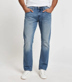 Front-facing image of faded straight-cut denim jeans styled casually on a male model - Royal Outfits Faded Straight Jeans Royal Outfits Jeans
