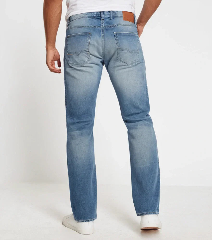 Front-facing image of faded straight-cut denim jeans styled casually on a male model - Royal Outfits Faded Straight Jeans Royal Outfits Jeans - Faded Straight Jeans - Royal Outfits - Jeans - Faded Straight Jeans - Royal Outfits