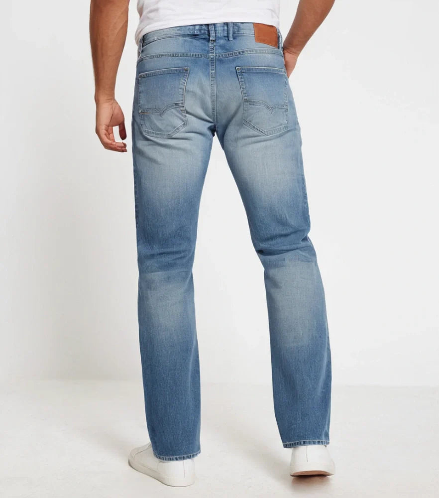 Classic straight-fit blue jeans styled on a model, front-facing with a slight fade and clean hem - Royal Outfits Straight Jeans with Classic Look Royal Outfits Jeans - Straight Jeans with Classic Look - Royal Outfits - Jeans - Straight Jeans with Classic Look - Royal Outfits