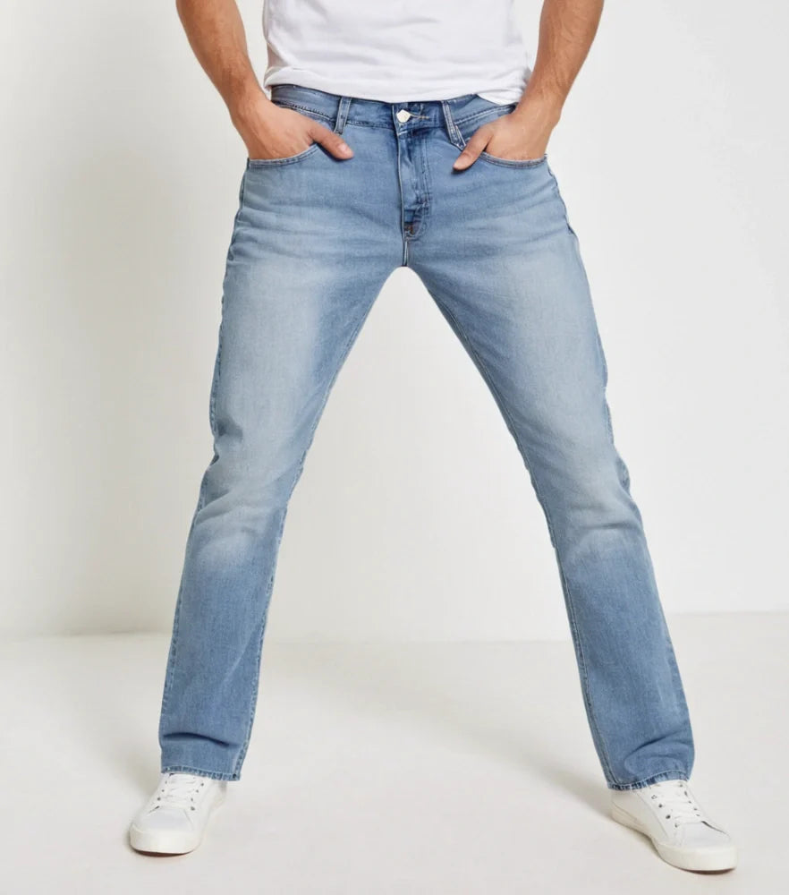 Classic straight-fit blue jeans styled on a model, front-facing with a slight fade and clean hem - Royal Outfits Straight Jeans with Classic Look Royal Outfits Jeans