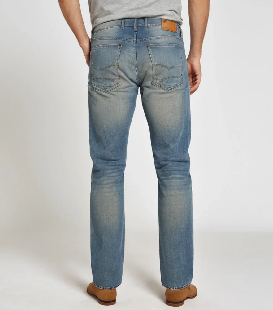 Front view of a model wearing classic blue straight-leg jeans with a clean hem and medium wash - Royal Outfits Classic Straight Jeans Royal Outfits Jeans - Classic Straight Jeans - Royal Outfits - Jeans - Classic Straight Jeans - Royal Outfits