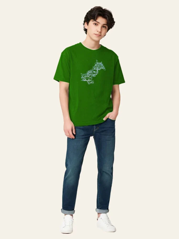 Person wearing a green t-shirt with text and blue jeans on a white background Graphic Green Pakistan Map T-Shirt Royal Outfits Printed T Shirts