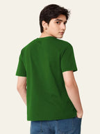 Person wearing a green t-shirt on a plain background Graphic Green Pakistan Map T-Shirt Royal Outfits Printed T Shirts
