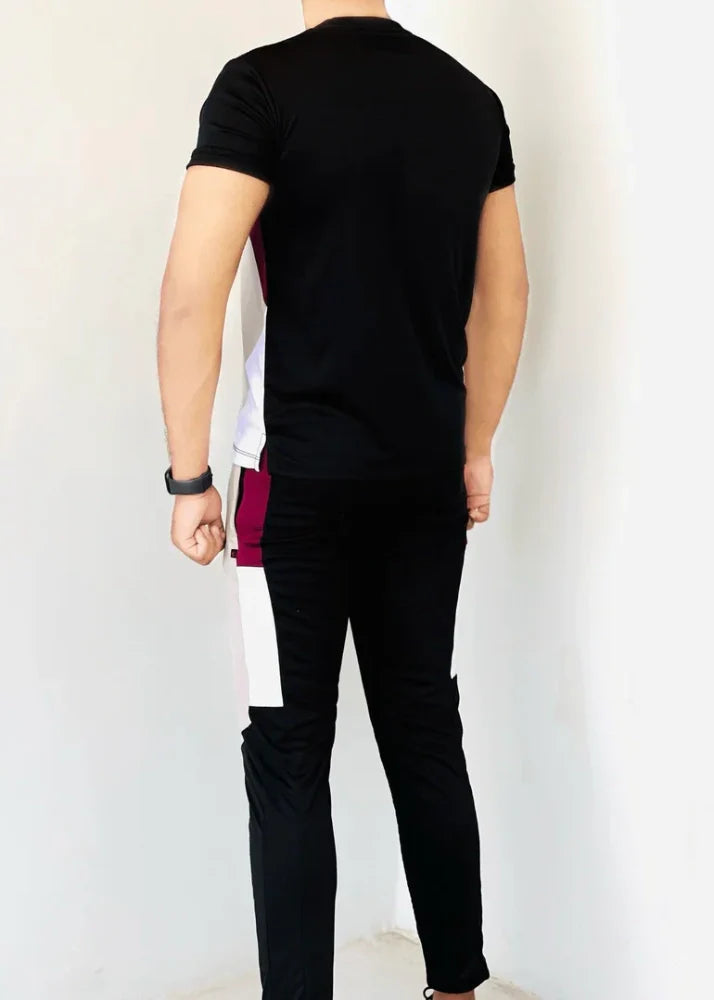 Gray Diamond-patterned track suit featuring a fitted jacket and tapered pants, styled on a male model - Royal Outfits Diamond Track Suit Royal Outfits Track Suits - Diamond Track Suit - Royal Outfits - Track Suits - Diamond Track Suit - Royal Outfits