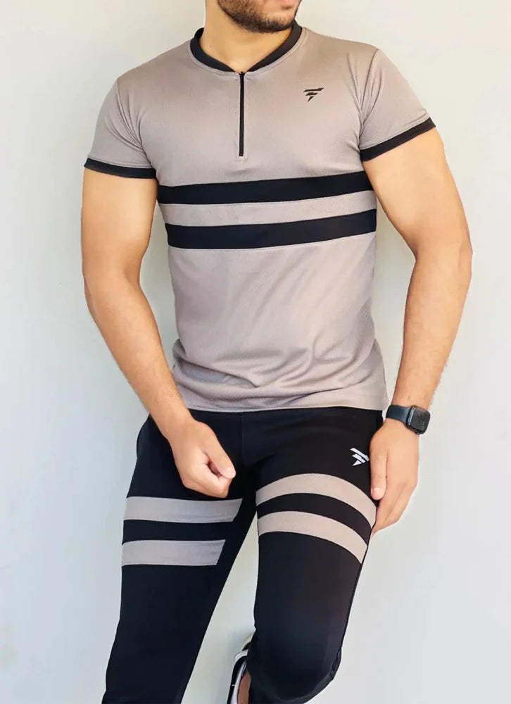 Model dressed in a beige full-sleeve track suit with a front zip and matching joggers - Royal Outfits Beige Track Suit for Men Royal Outfits Track Suits