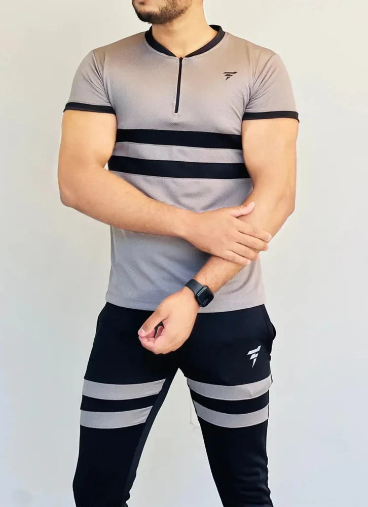 Model dressed in a beige full-sleeve track suit with a front zip and matching joggers - Royal Outfits Beige Track Suit for Men Royal Outfits Track Suits - Beige Track Suit for Men - Royal Outfits - Track Suits - Beige Track Suit for Men - Royal Outfits
