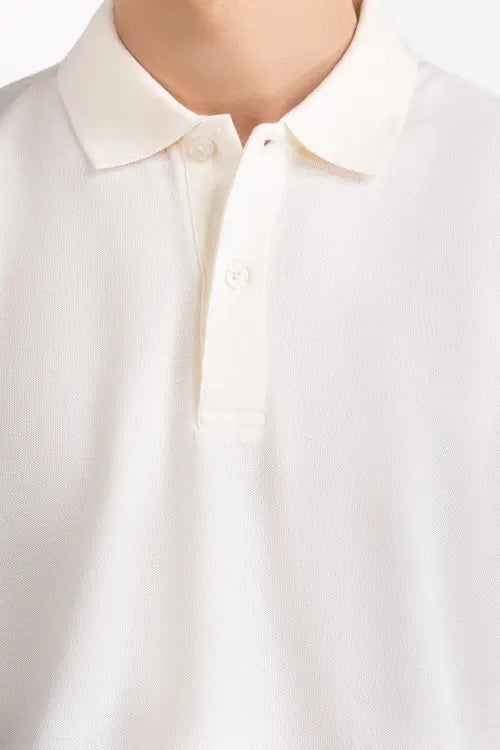 Close-up of a white shirt with a collar on a plain background White Regular Fit Men POLO T-Shirt Royal Outfits POLO T Shirts