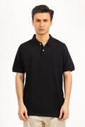 Man wearing a black polo shirt on a white background Black Regular Fit Men POLO T-Shirt Royal Outfits POLO T Shirts
