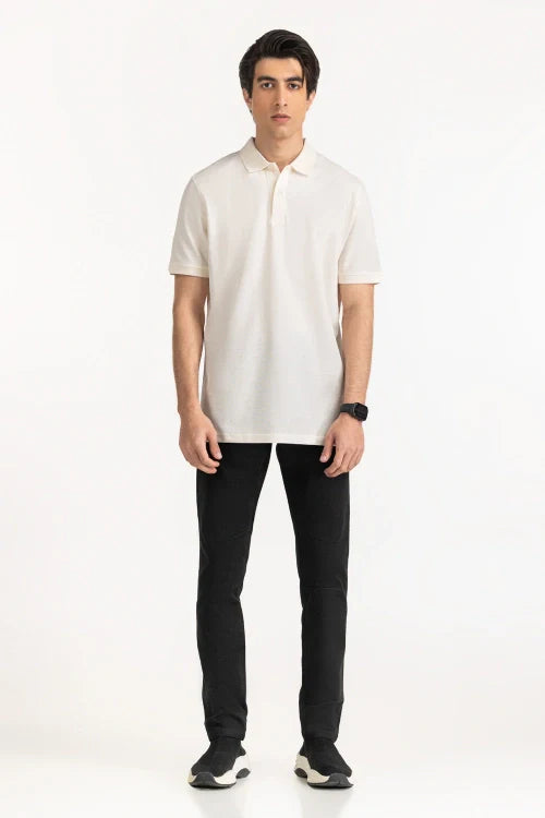 Man wearing a white polo shirt and black pants on a white background White Regular Fit Men POLO T-Shirt Royal Outfits POLO T Shirts
