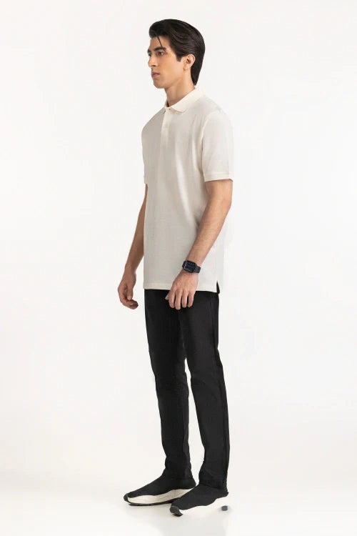 Man wearing a white polo shirt and black pants on a white background White Regular Fit Men POLO T-Shirt Royal Outfits POLO T Shirts