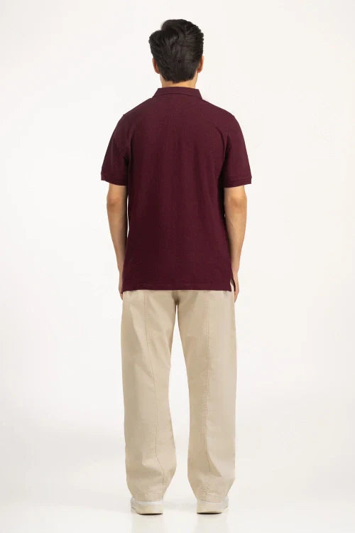 Man wearing a maroon polo shirt and beige pants on a white background Maroon Regular Fit Men POLO T-Shirt Royal Outfits POLO T Shirts - Maroon Regular Fit Men POLO T-Shirt - Royal Outfits - POLO T Shirts - Maroon Regular Fit Men POLO T-Shirt - Royal Outfits