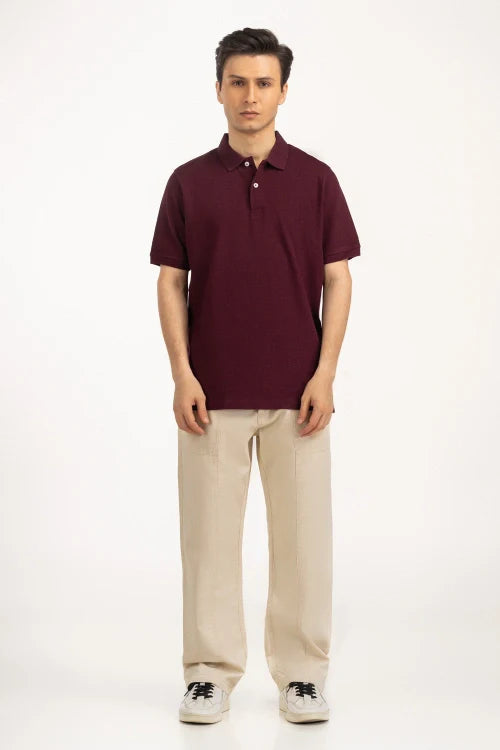 Man wearing a maroon polo shirt and beige pants on a white background Maroon Regular Fit Men POLO T-Shirt Royal Outfits POLO T Shirts