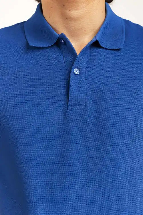 Close-up of a blue polo shirt with a collar Blue Regular Fit Men POLO T-Shirts Royal Outfits POLO T Shirts