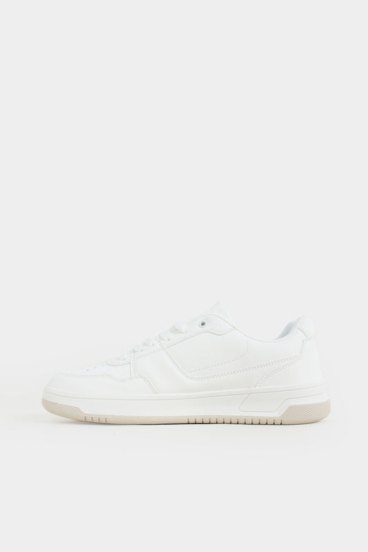 White sneaker on a light gray background Low Top Sneakers Royal Outfits Sneakers