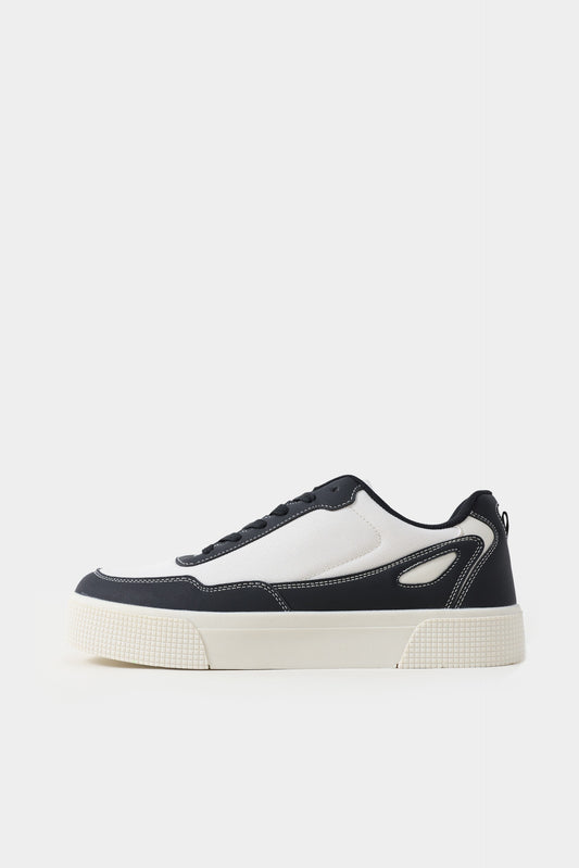 Black and white sneaker on a light gray background Multi Low Top Sneakers Royal Outfits Sneakers