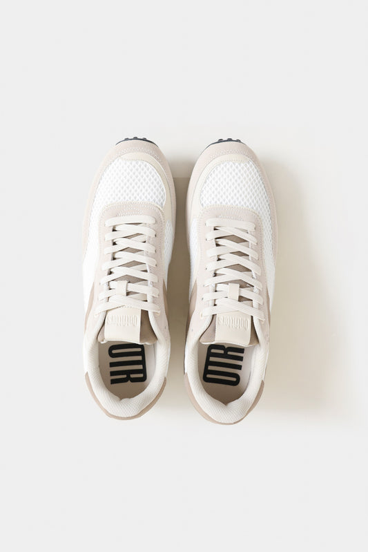 White sneakers with black logo on a white background Contrast Sneakers Royal Outfits Sneakers - Contrast Sneakers - Royal Outfits - Sneakers - Contrast Sneakers - Royal Outfits