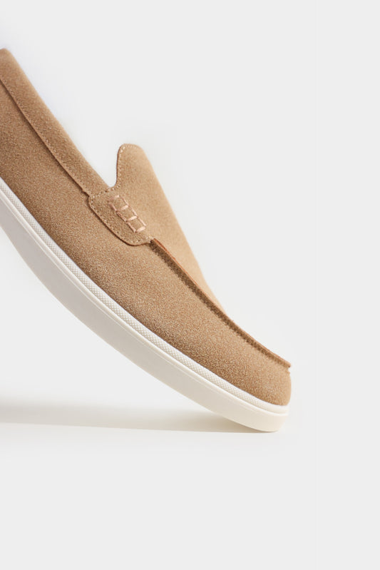 Beige slip-on shoe on a white background Suede Loafers Royal Outfits Loafers