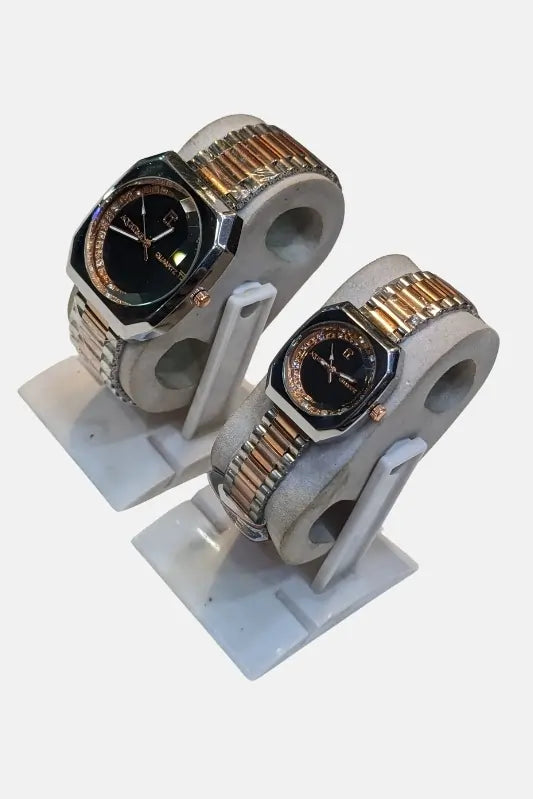 Two watches Gold and Silver on a white stand with a plain background (Couple's).
