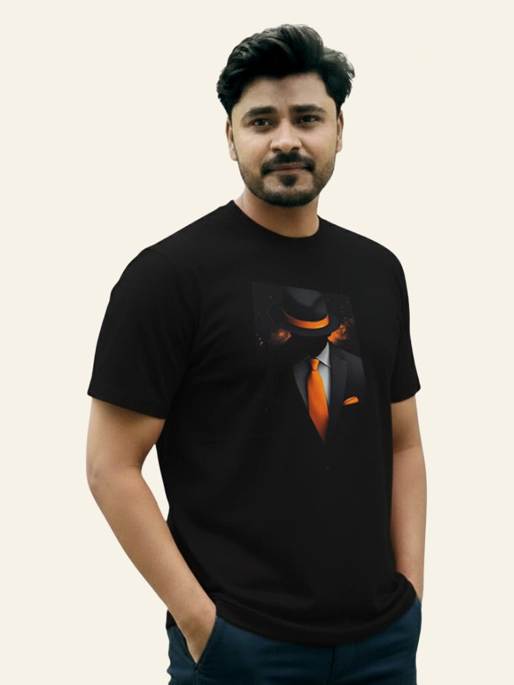Man wearing a black t-shirt with a graphic design on a beige background Graphic Black Boss T-Shirt Royal Outfits Graphic T Shirts