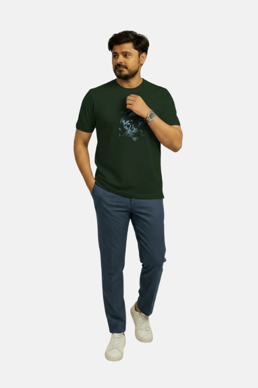 Man wearing a green t-shirt and blue pants on a white background Graphic Dark Green Lion T-Shirt Royal Outfits Printed T Shirts - Graphic Dark Green Lion T-Shirt - Royal Outfits - Printed T Shirts