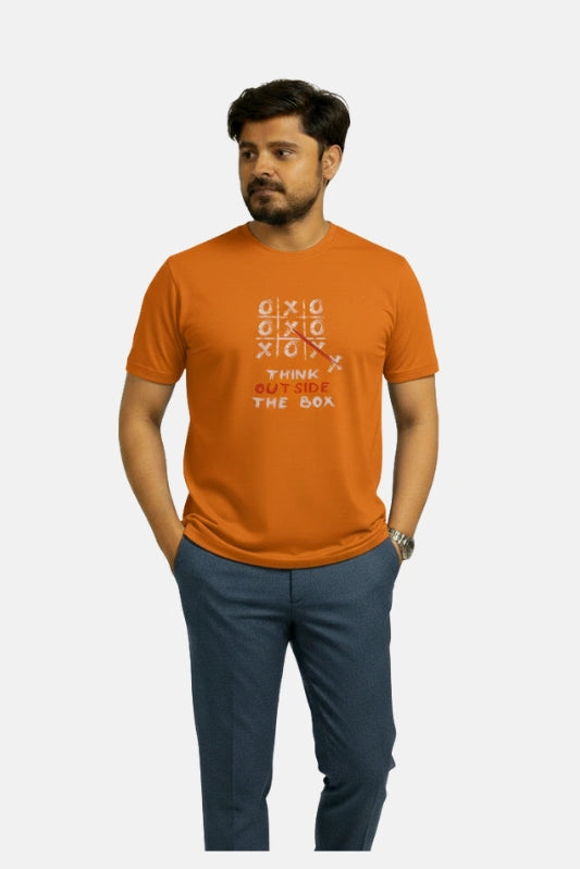 Man wearing an orange t-shirt with text and design on a plain background Graphic Orange Crossword T-Shirt Royal Outfits Graphic T Shirts - Graphic Orange Crossword T-Shirt - Royal Outfits - Graphic T Shirts - Graphic Orange Crossword T-Shirt - Royal Outfits
