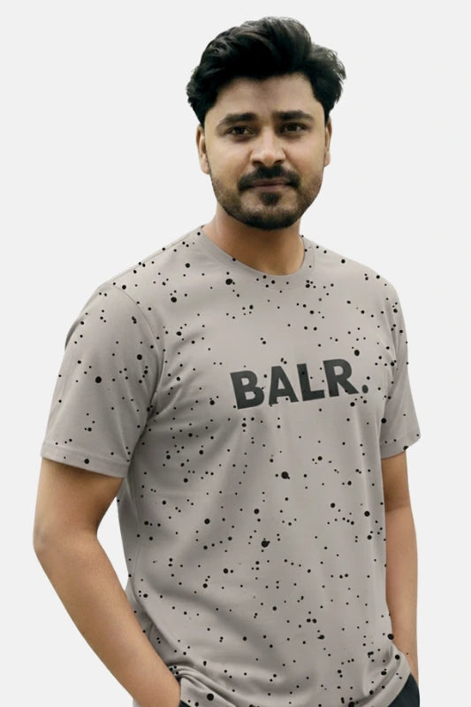 Man wearing a gray t-shirt with 'BALR.' branding on a plain background Light Grey ‘BALR’ T-Shirt Royal Outfits Graphic T Shirts - Light Grey ‘BALR’ T-Shirt - Royal Outfits - Graphic T Shirts - Light Grey ‘BALR’ T-Shirt - Royal Outfits