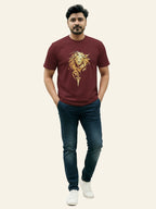 Man wearing a maroon t-shirt with a lion graphic design on a beige background Graphic Maroon ‘Lion’ T-Shirt Royal Outfits Printed T Shirts
