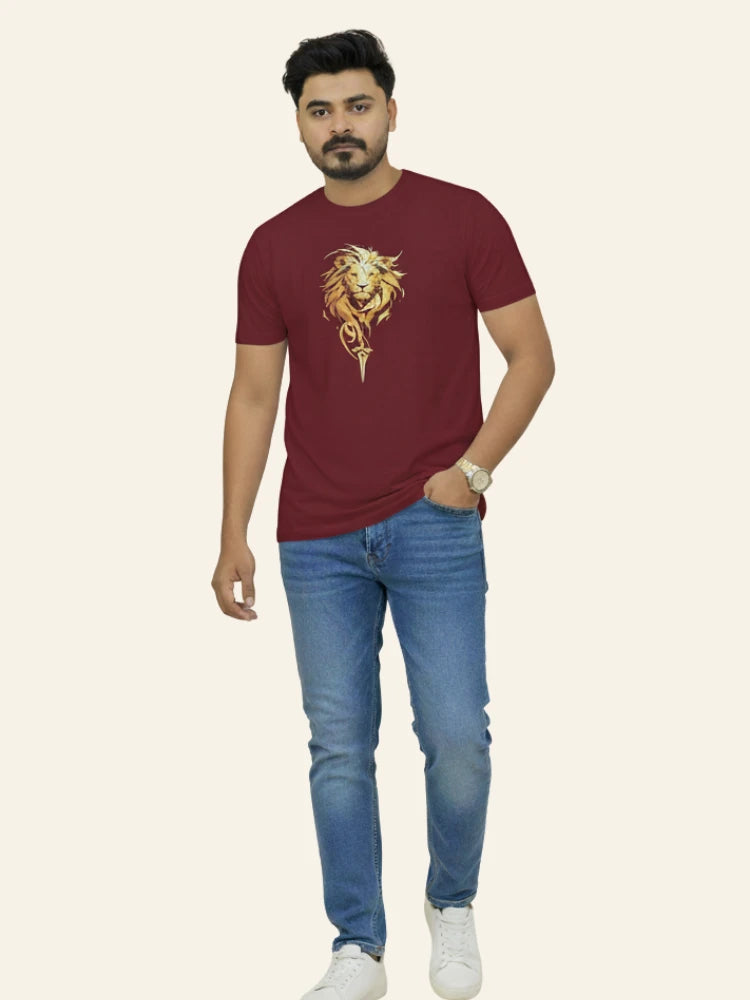 Man wearing a maroon t-shirt with a lion graphic and blue jeans on a white background Graphic Maroon ‘Lion’ T-Shirt Royal Outfits Printed T Shirts
