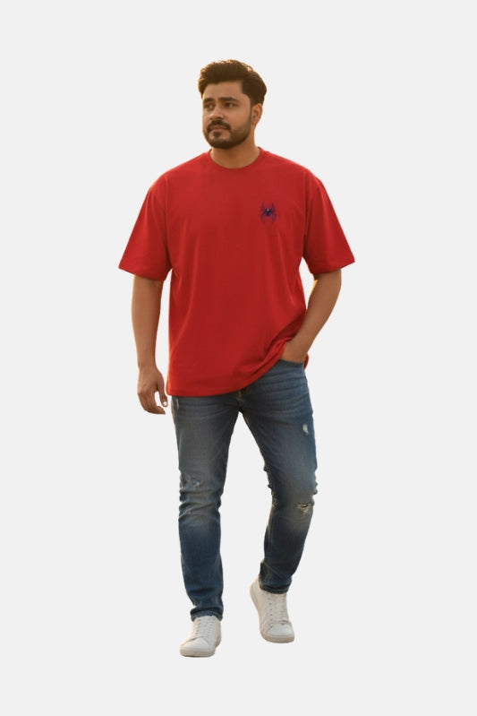 Man wearing a red t-shirt and blue jeans on a plain background Graphic Red Drop Shoulder Spider T-Shirt Royal Outfits Drop Shoulder T-Shirts - Graphic Red Drop Shoulder Spider T-Shirt - Royal Outfits - Drop Shoulder T-Shirts - Graphic Red Drop Shoulder Spider T-Shirt - Royal Outfits