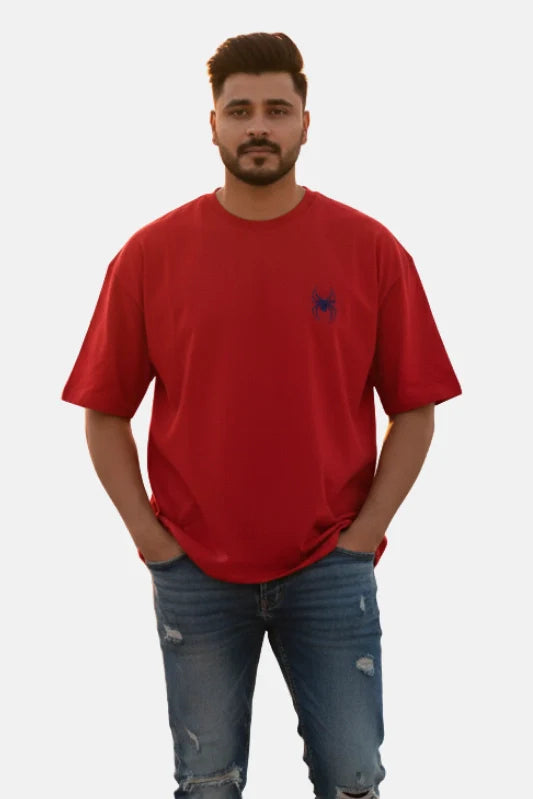 Man wearing a red t-shirt with a small logo on a plain background Graphic Red Drop Shoulder Spider T-Shirt Royal Outfits Drop Shoulder T-Shirts - Graphic Red Drop Shoulder Spider T-Shirt - Royal Outfits - Drop Shoulder T-Shirts - Graphic Red Drop Shoulder Spider T-Shirt - Royal Outfits