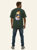 Man wearing a green t-shirt with a nature-themed design on the back, standing against a white background. Graphic Green Drop Shoulder Feather T-Shirt Royal Outfits Drop Shoulder T-Shirts