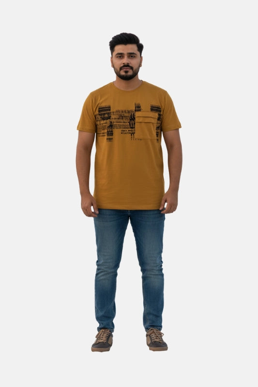 Man wearing a mustard t-shirt with text and blue jeans on a white background - Graphic Mustard Colour T-Shirt with Chest Pocket - Royal Outfits - Printed T Shirts - Graphic Mustard Colour T-Shirt with Chest Pocket - Royal Outfits