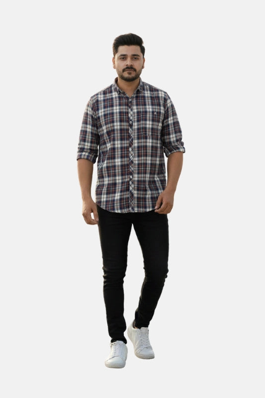 Man wearing a checkered shirt, black pants, and white sneakers on a plain background - Men’s Casual Slim Fit Plaid Checked Shirt – Navy Blue, White & Maroon Cotton Button-Up - Royal Outfits - Check Shirts